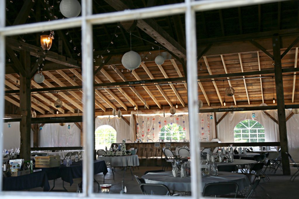 Wedding reception tables at barn wedding venue Blodgett Wedding Barn in Schoolcraft, Michigan