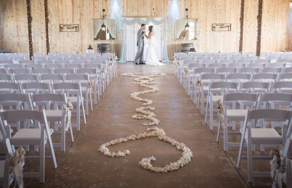 Wedding ceremony at country wedding venue Berry Acres in Odessa, Missouri