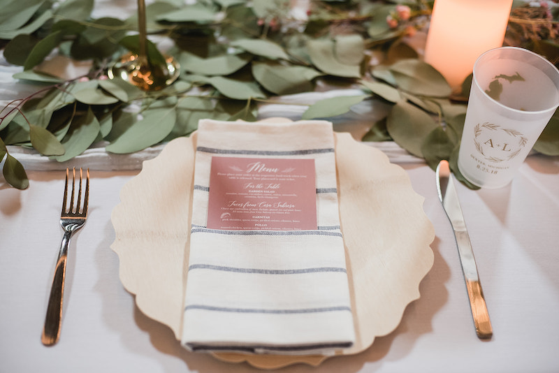 Rustic wedding place setting at barn wedding at Nixon Farms in Michigan