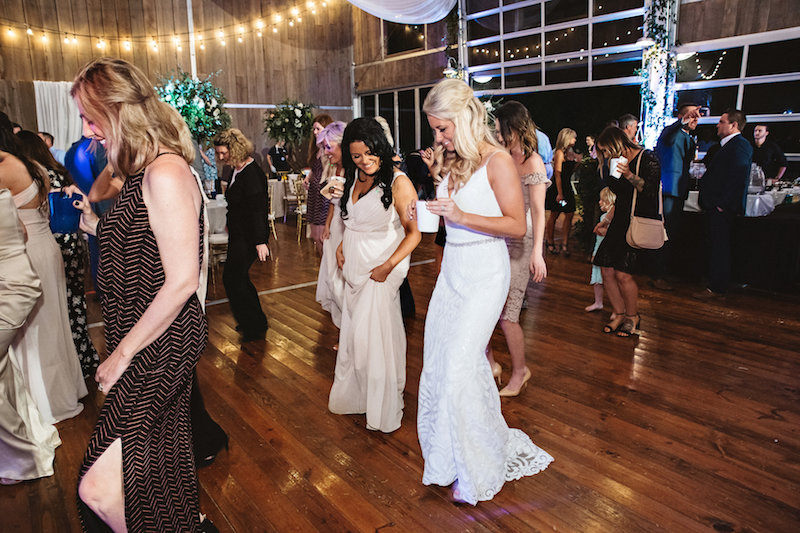 Bride dancing at a wedding at Spring Creek Ranch in Tennessee