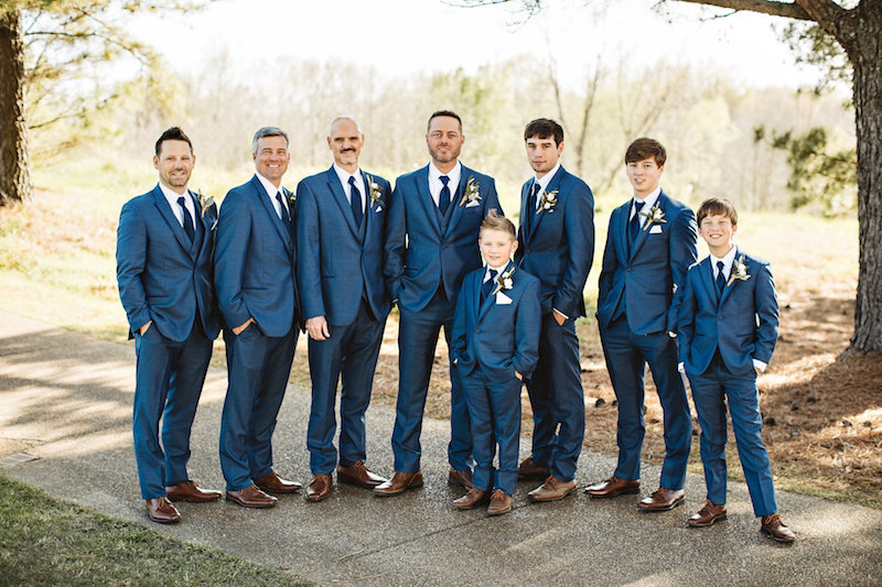 Groom and groomsmen at barn wedding at Spring Creek Ranch in Tennessee