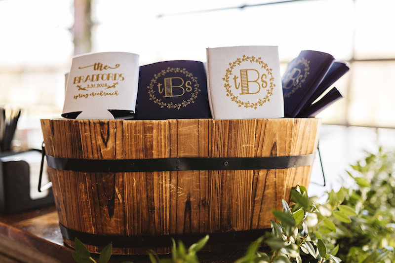 Monogrammed wedding koozies at barn wedding at Spring Creek Ranch in Tennessee