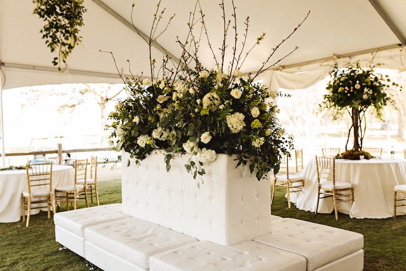 Wedding cocktail hour lounge at barn wedding at Spring Creek Ranch in Tennessee